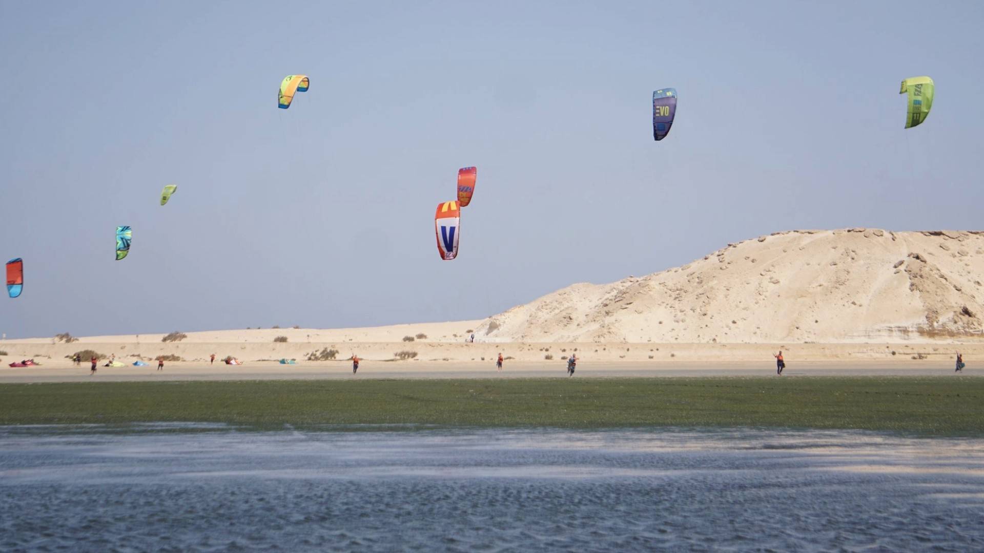 Colorful kites dance above Dakhla’s shallow waters and desert dunes, where modern sport meets ancient wind symbolizing how the region’s traditions, from weaving to hospitality, are shaped not by resisting change, but by moving with it.